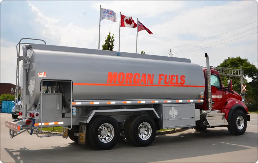 wrapped fuel truck parked on the road