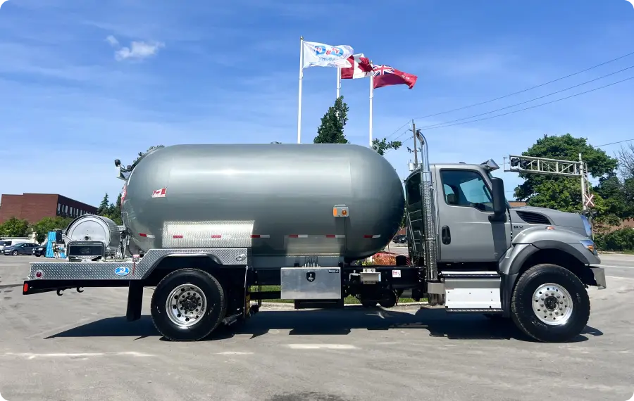 wrapped fuel truck parked on the road