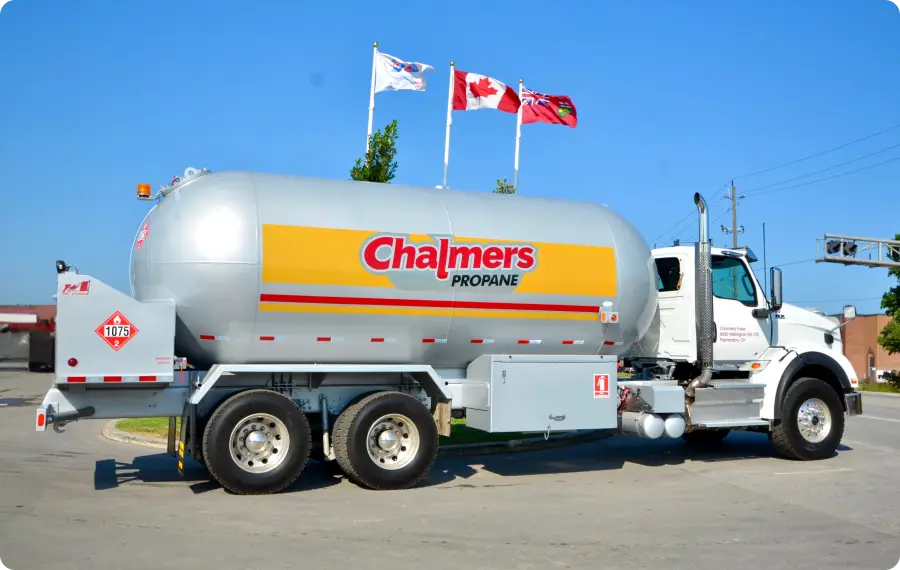 wrapped fuel truck parked on the road