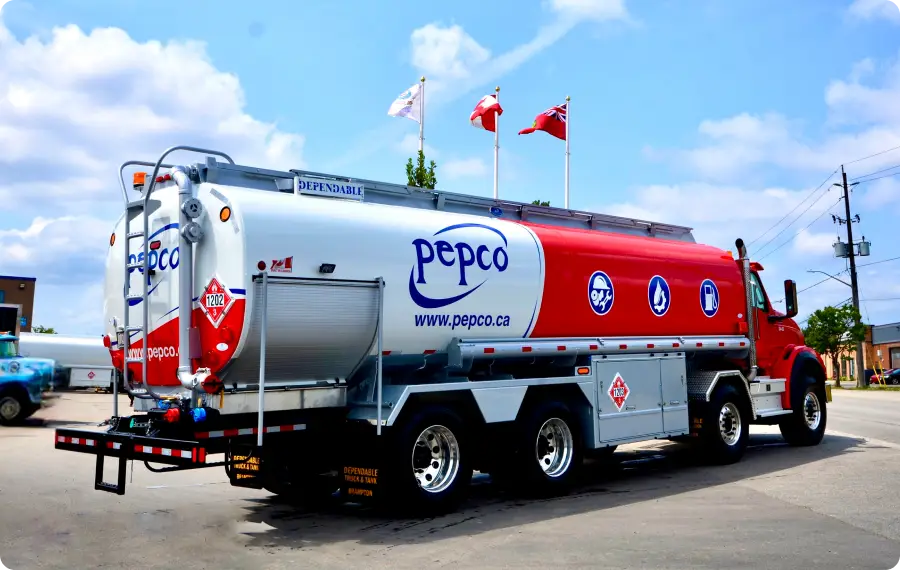 wrapped fuel truck parked on the road