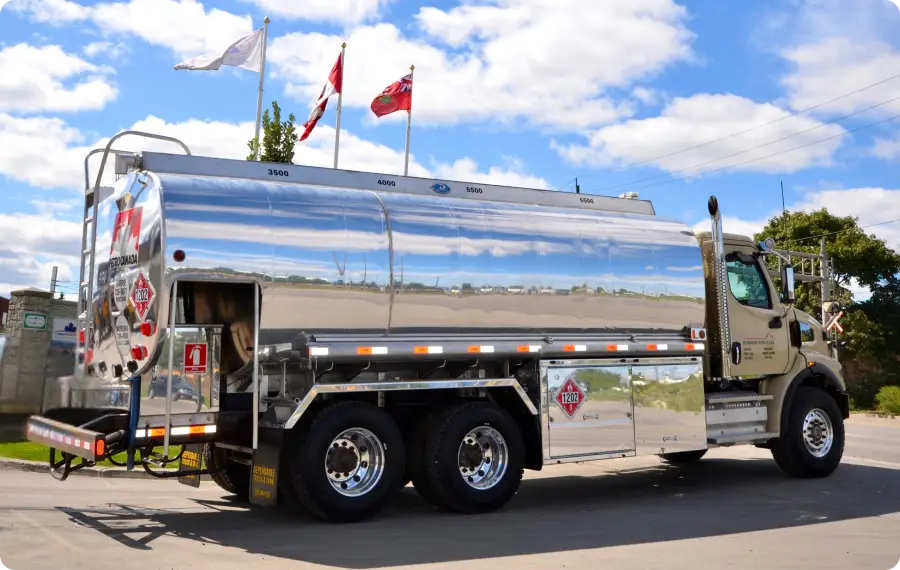 wrapped fuel truck parked on the road