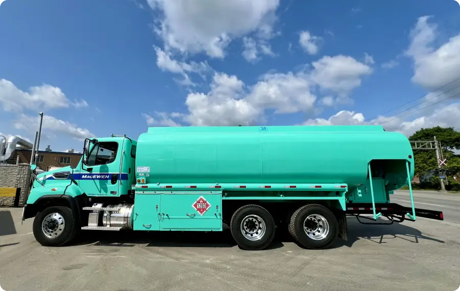 wrapped fuel truck parked on the road