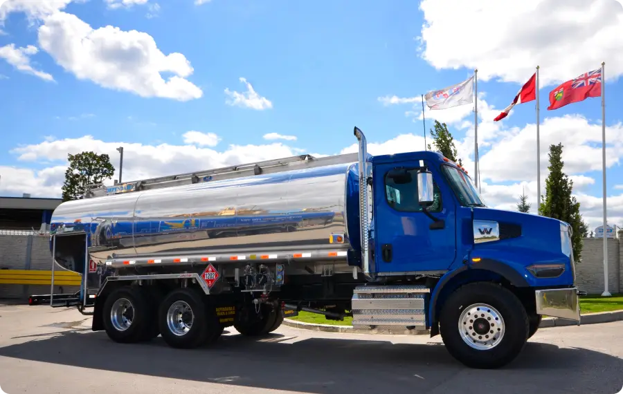 wrapped fuel truck parked on the road