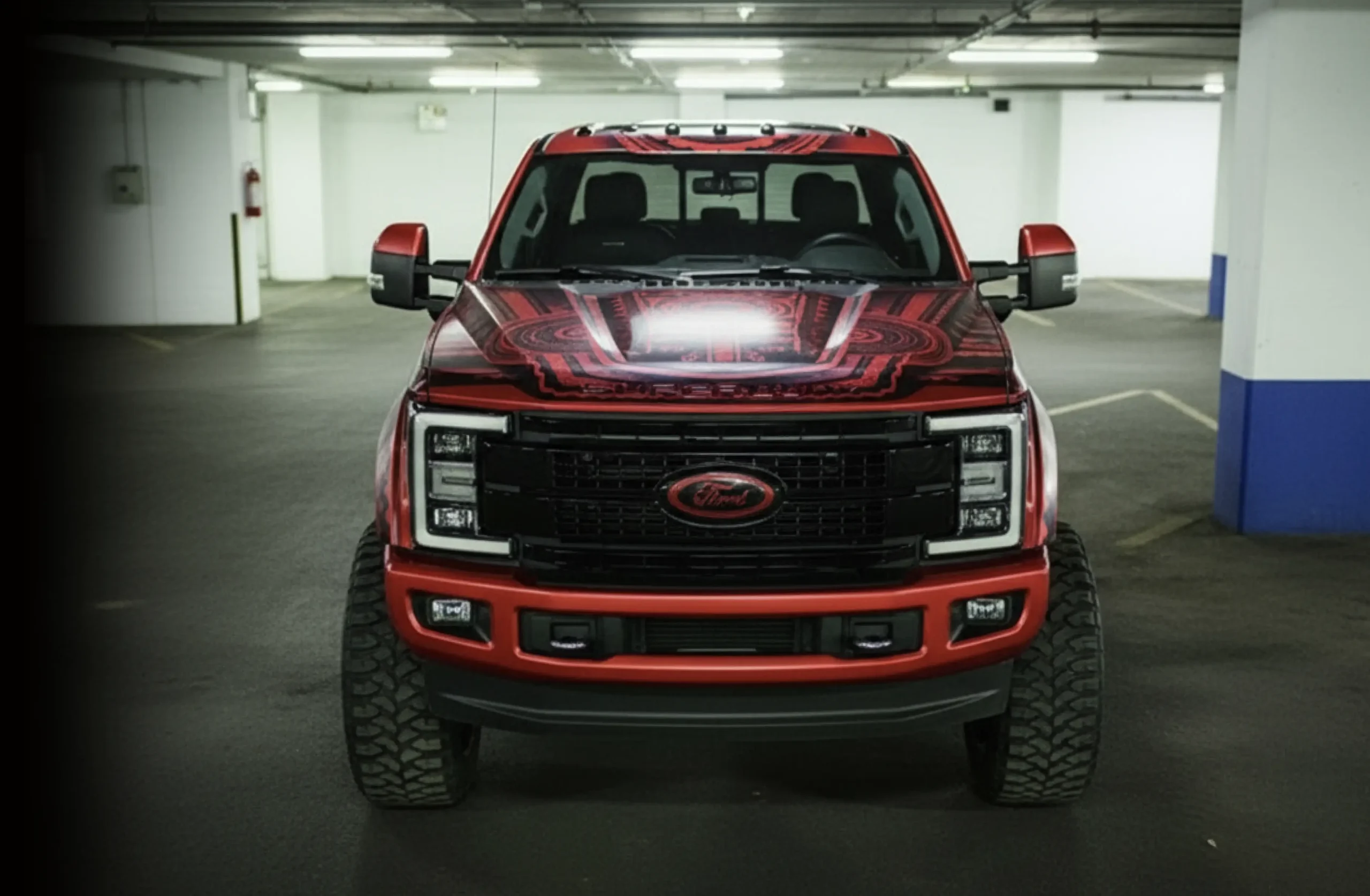 Red truck with intricate design