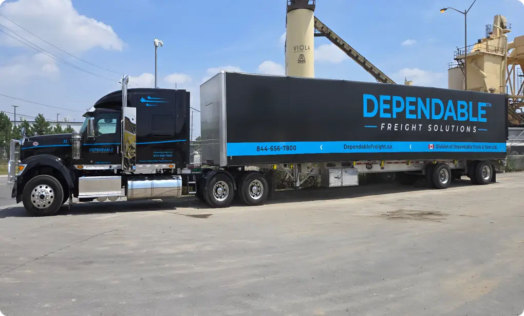 wrapped delivery truck parked outside