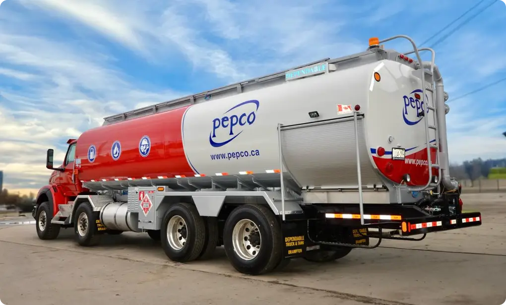 wrapped fuel truck parked on the road