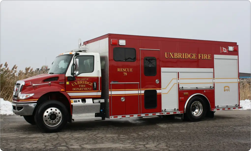 wrapped emergency vehicle parked on the road