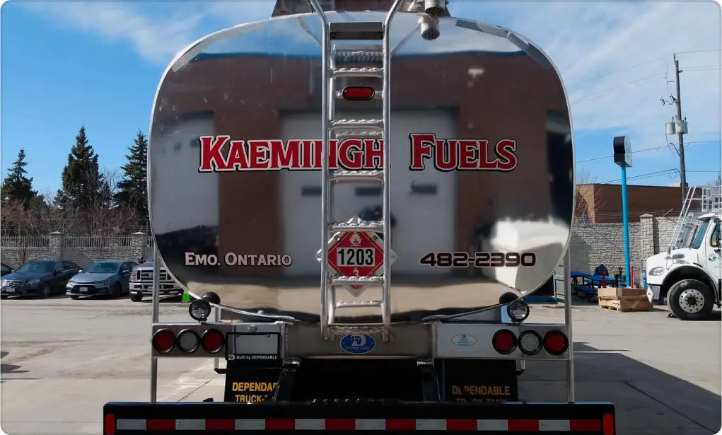 wrapped fuel truck parked on the road